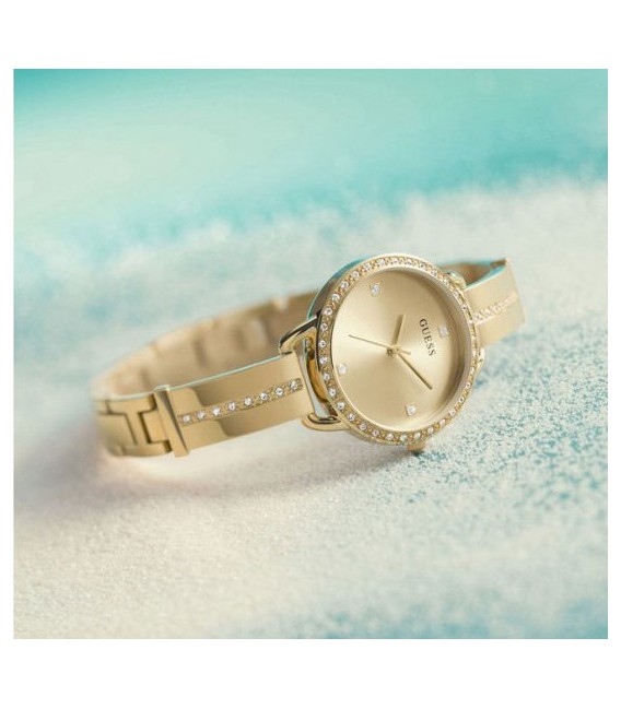 Reloj Mujer Guess de 30 mm en acero inoxidable dorado con piedras.